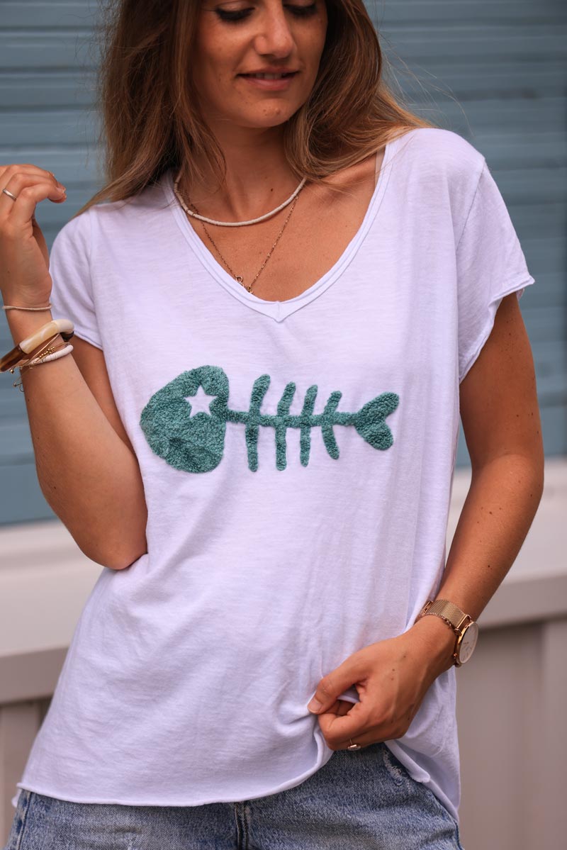 White cotton t-shirt with celadon green fish design in boucle