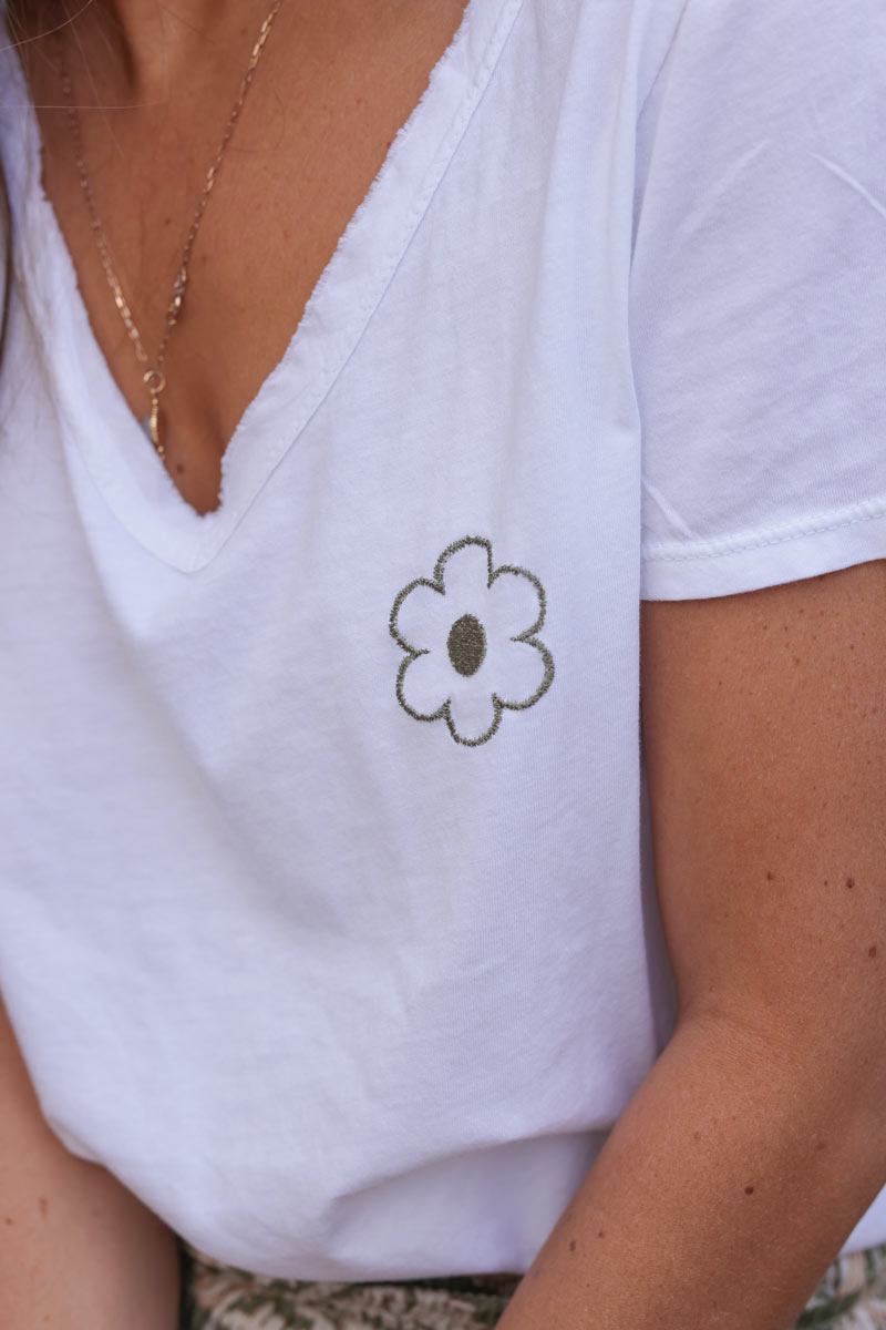 White cotton t-shirt with embroidered daisy detail in khaki