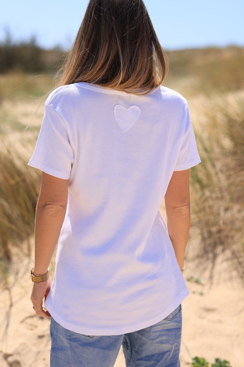 White ribbed t-shirt with large denim embroidered daisy