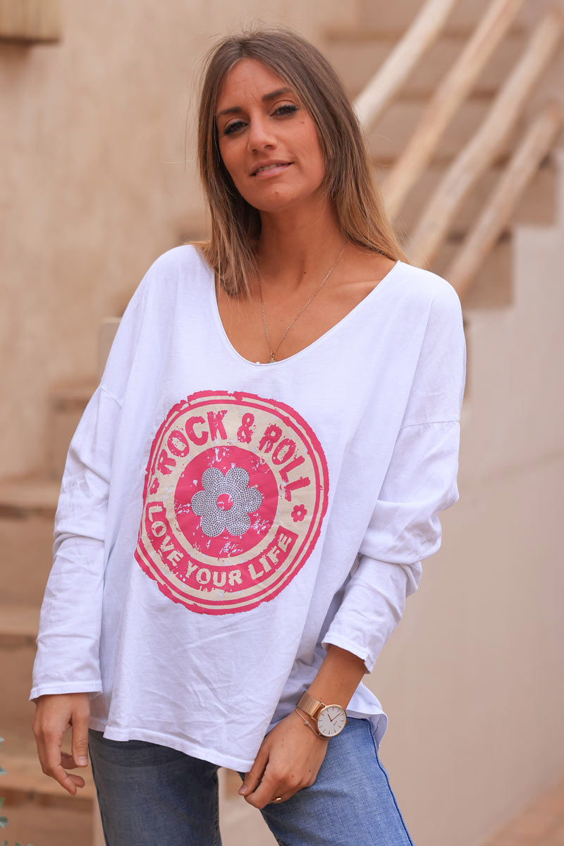 White cotton long sleeve top with fuchsia rock and roll flower print