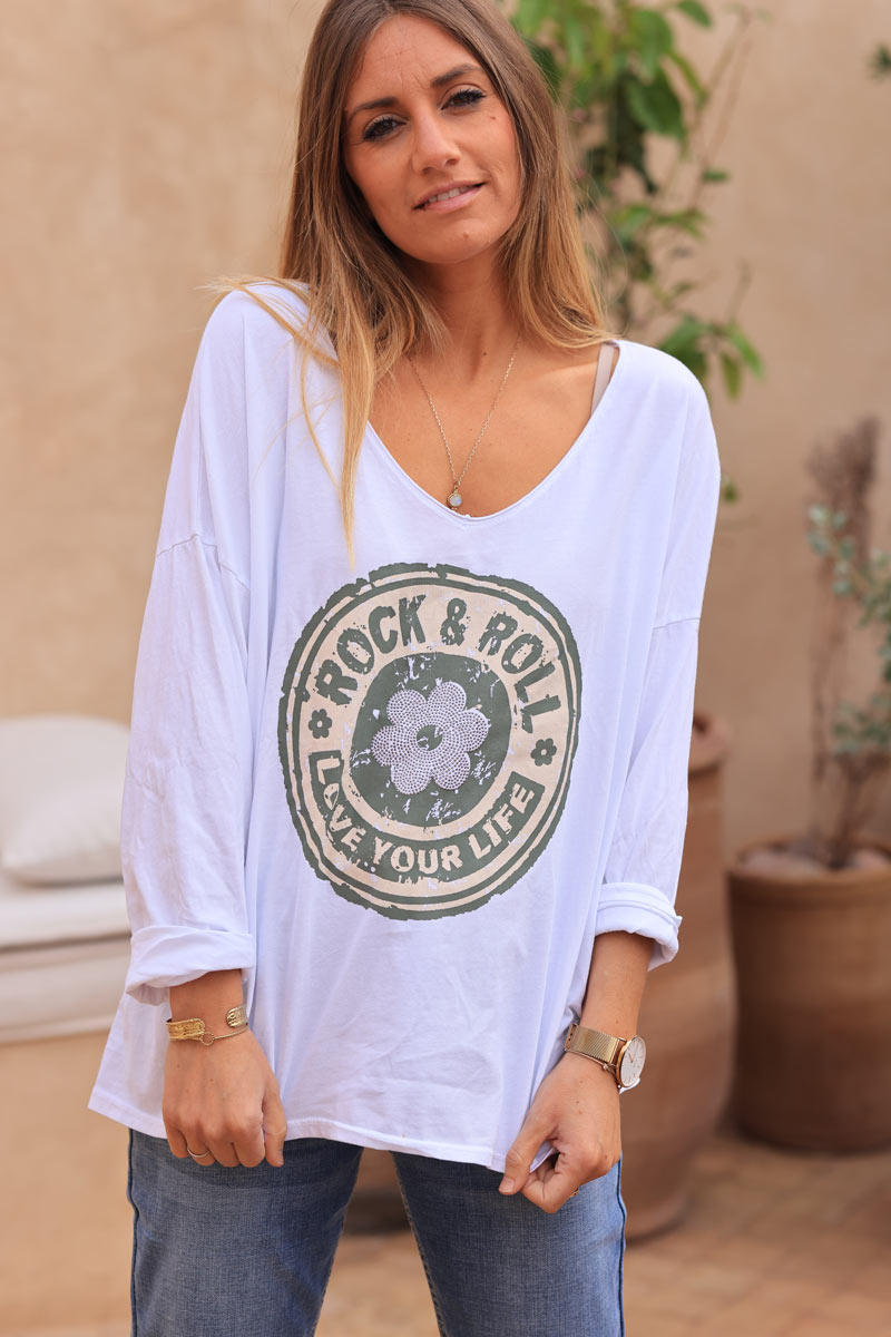 White cotton long sleeve top with khaki rock and roll flower print
