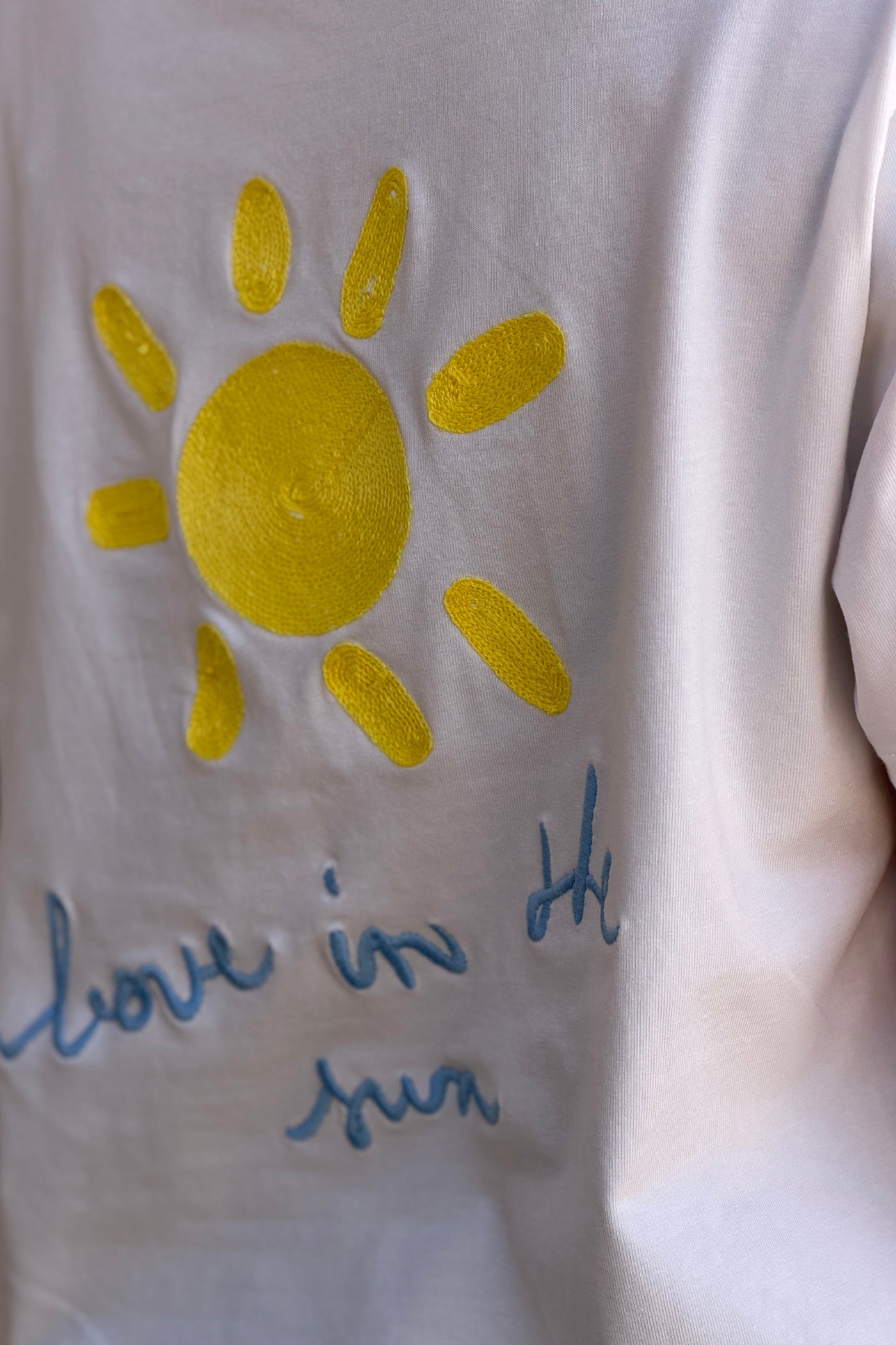 White / Blue V-Neck “Love in the Sun” Jersey Knit Tee
