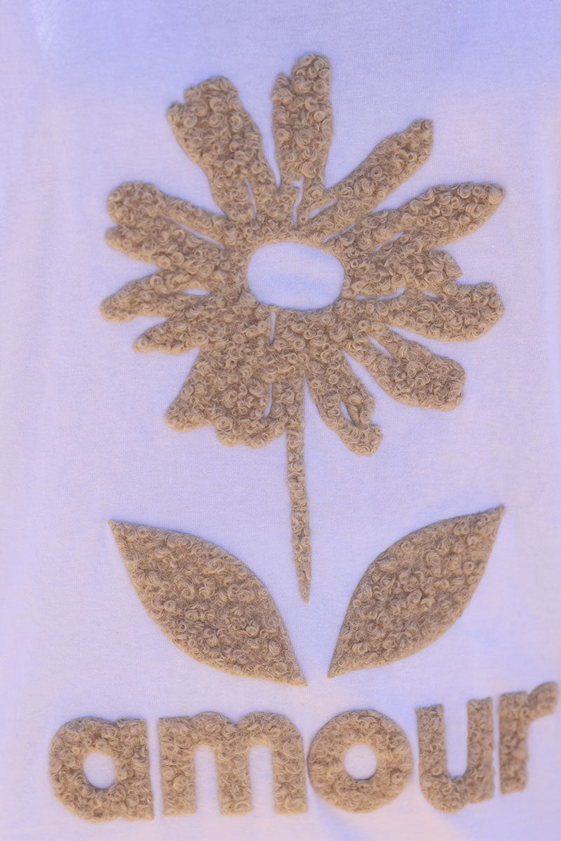 T-shirt blanc stretch en coton col v marguerite amour bouclettes