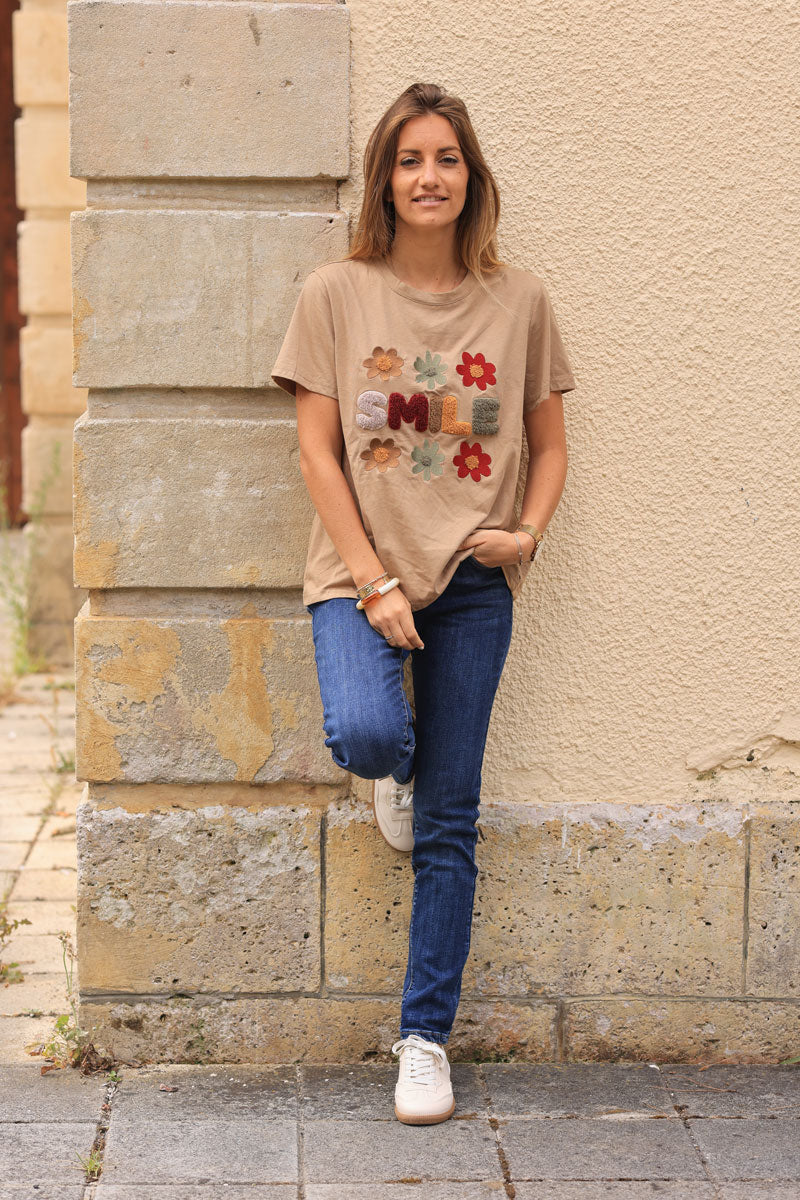 Camel loose t-shirt with colorful ‘SMILE’ and flowers in boucle