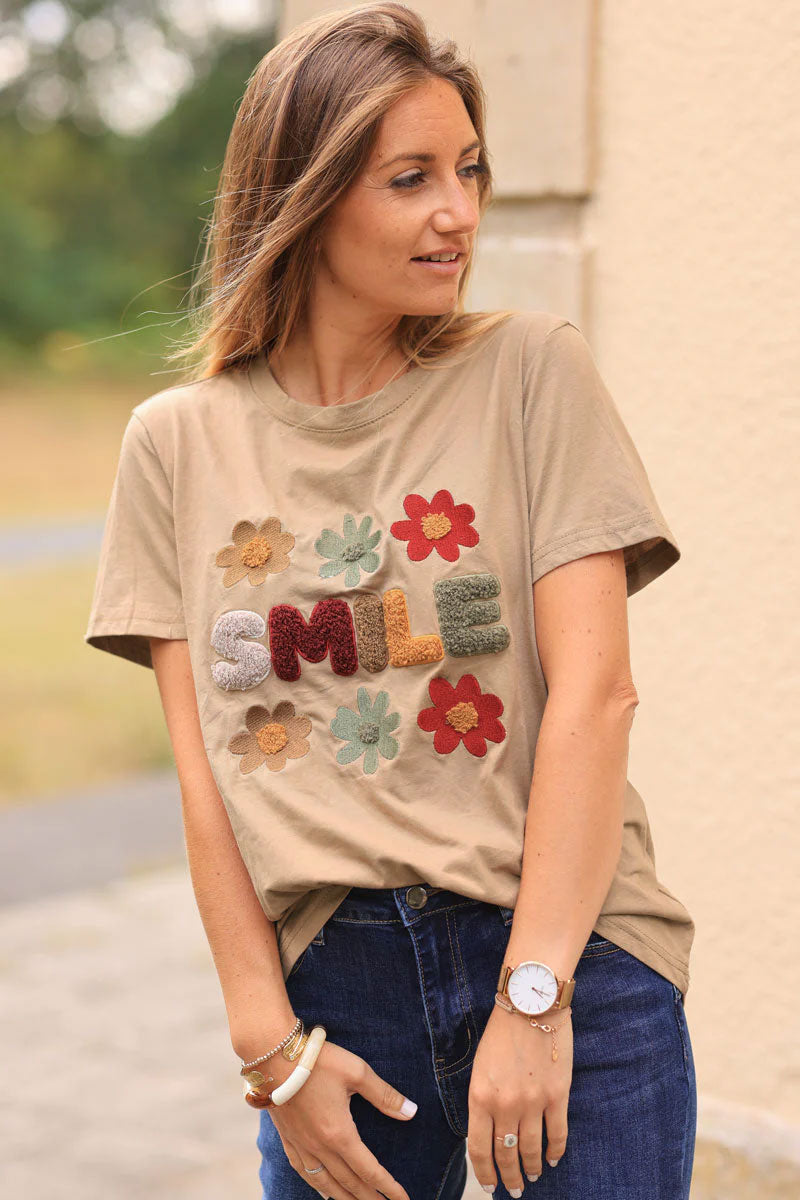 Camel loose t-shirt with colorful ‘SMILE’ and flowers in boucle