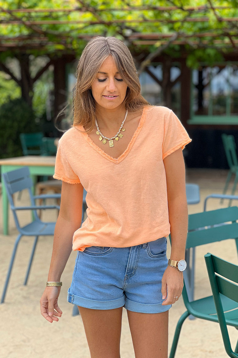 T-shirt coton stretch orange fluo délavé finitions petites franges