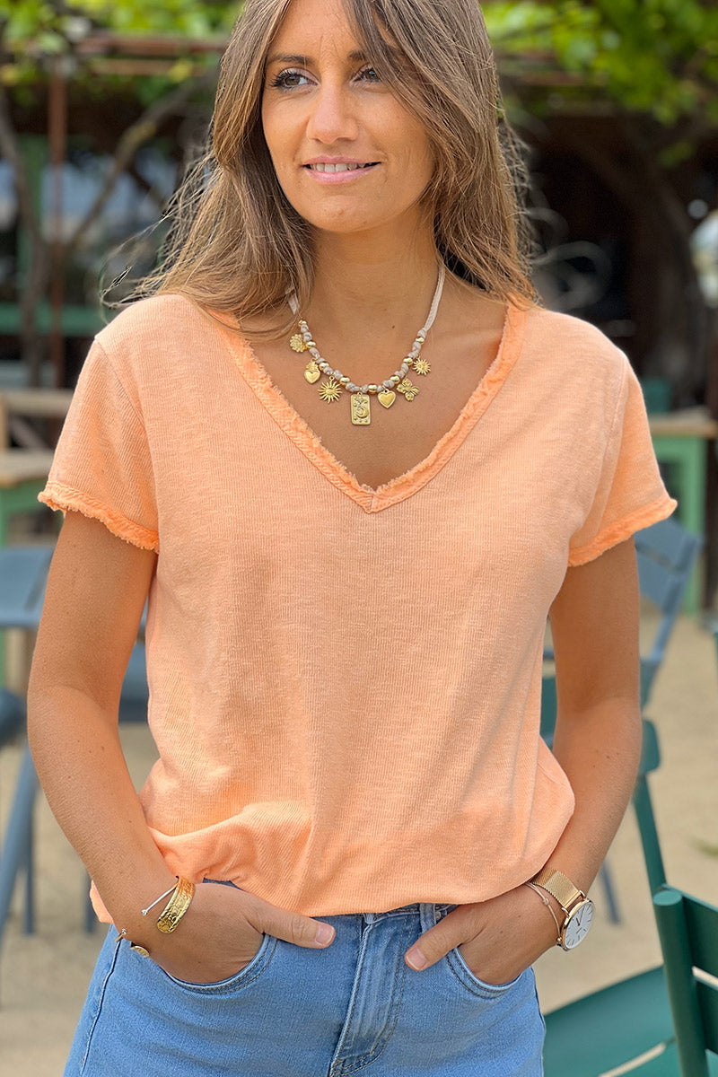 T-shirt coton stretch orange fluo délavé finitions petites franges