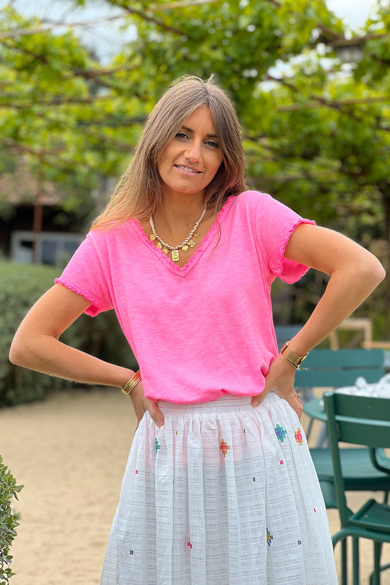 T-shirt coton stretch rose fluo délavé finitions petites franges