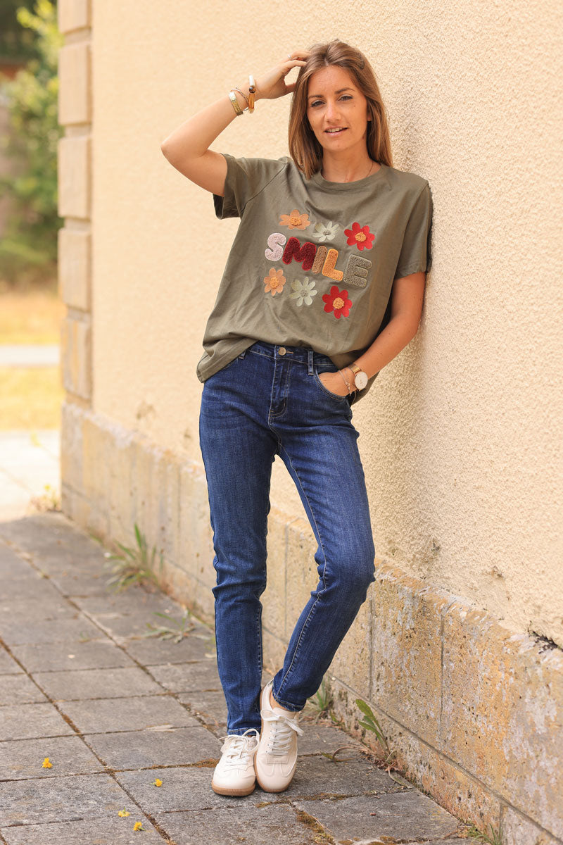 Khaki loose t-shirt with colorful ‘SMILE’ and flowers in boucle