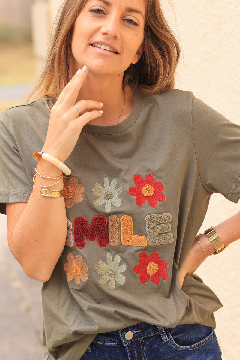 Khaki loose t-shirt with colorful ‘SMILE’ and flowers in boucle