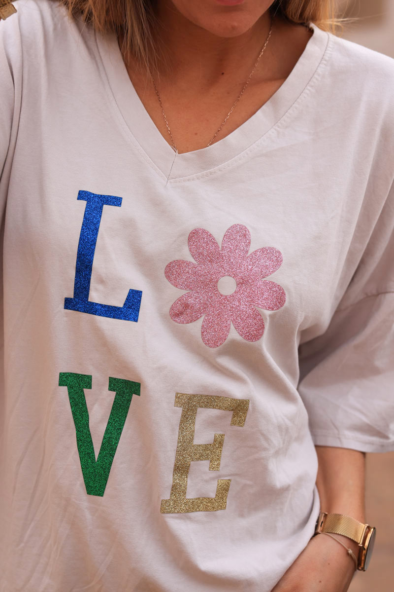 Camiseta grande de algodón beige con mangas holgadas LOVE flores brillantes