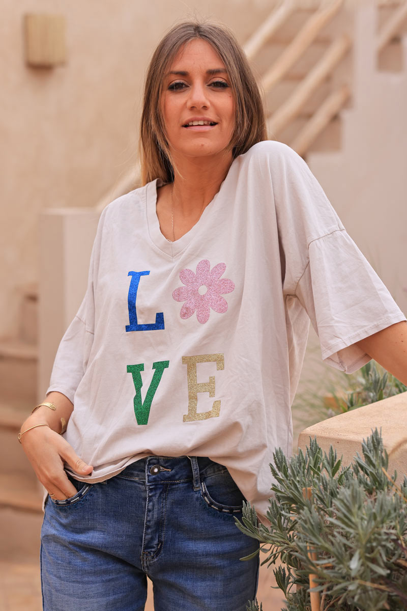 Camiseta grande de algodón beige con mangas holgadas LOVE flores brillantes