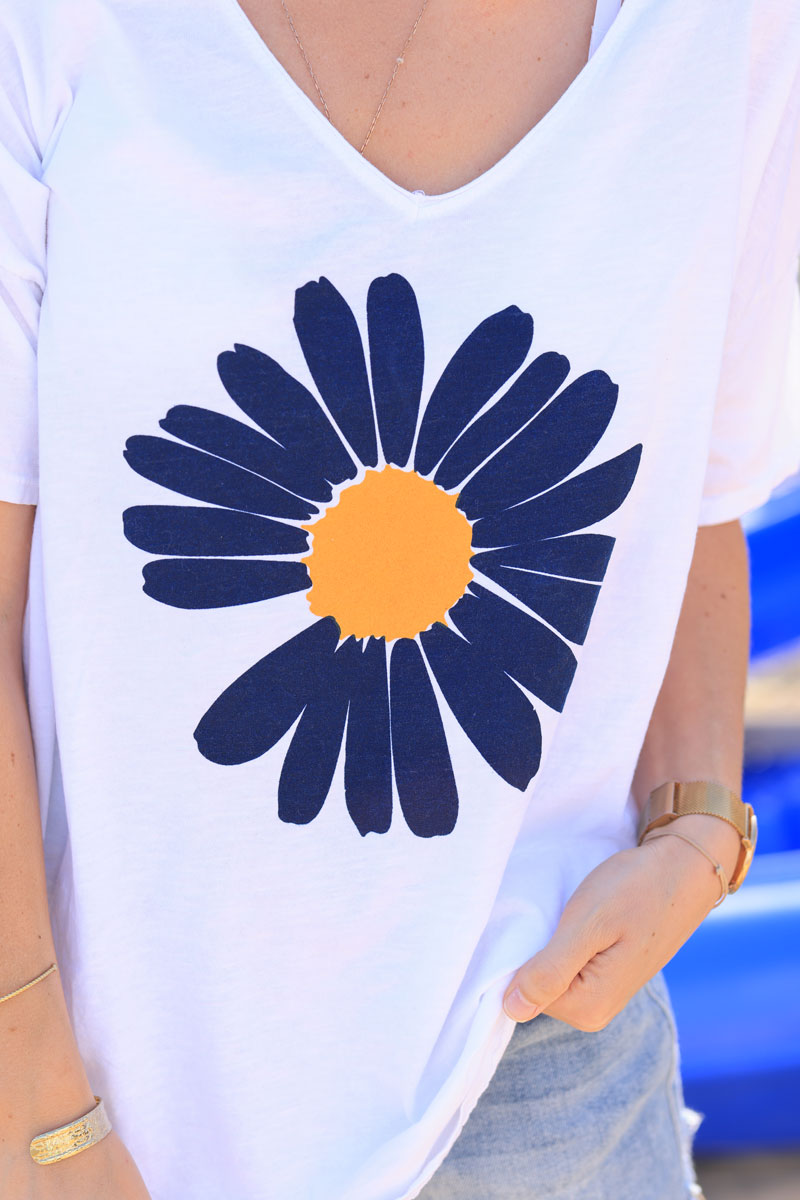 White oversized cotton t-shirt with large navy blue daisy print