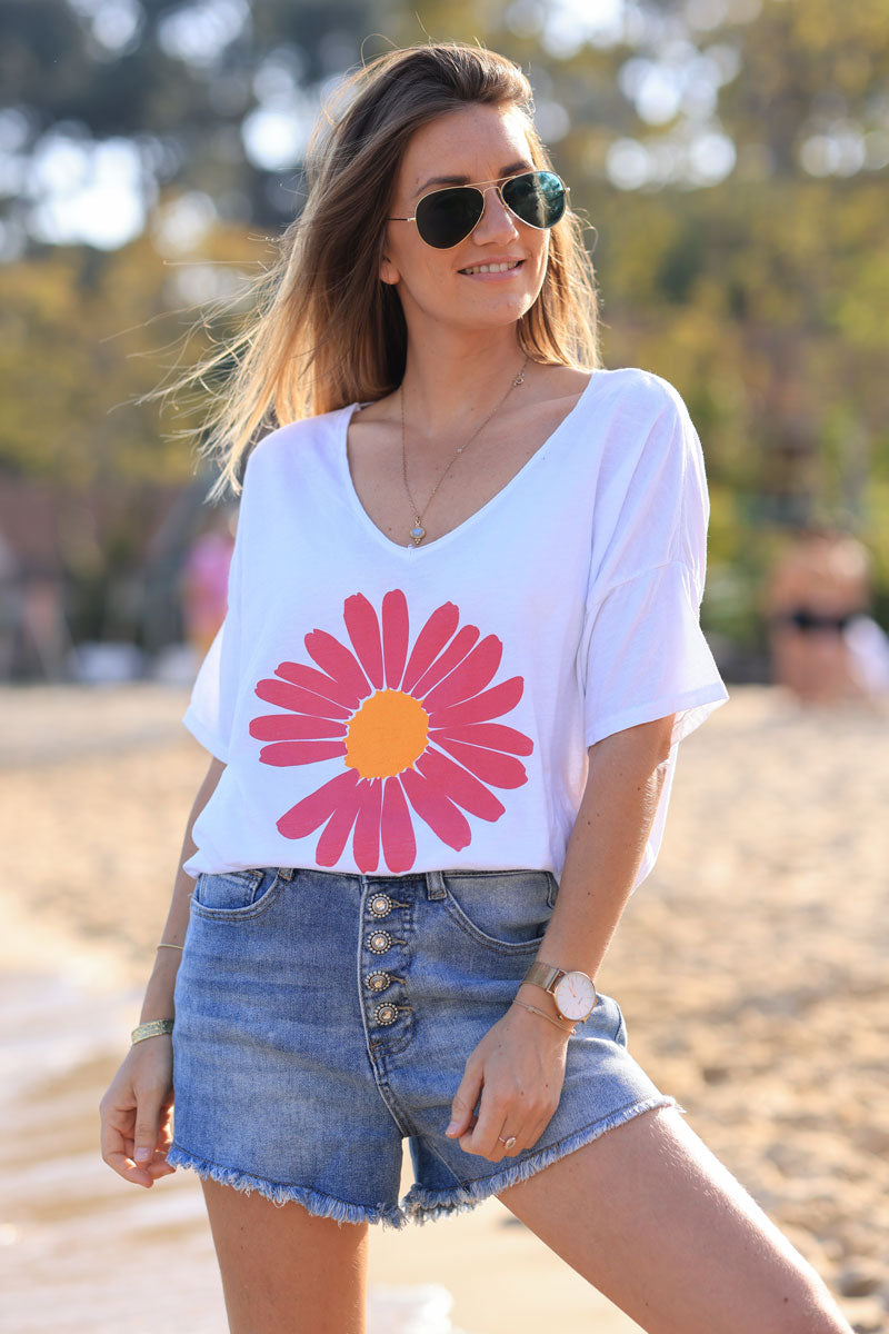 White oversized cotton t-shirt with large fuchsia daisy print