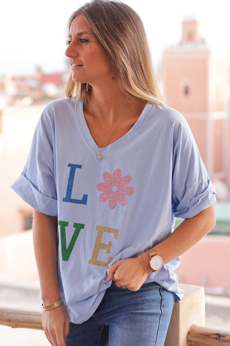 Camiseta grande de algodón azul cielo con mangas holgadas LOVE flores brillantes