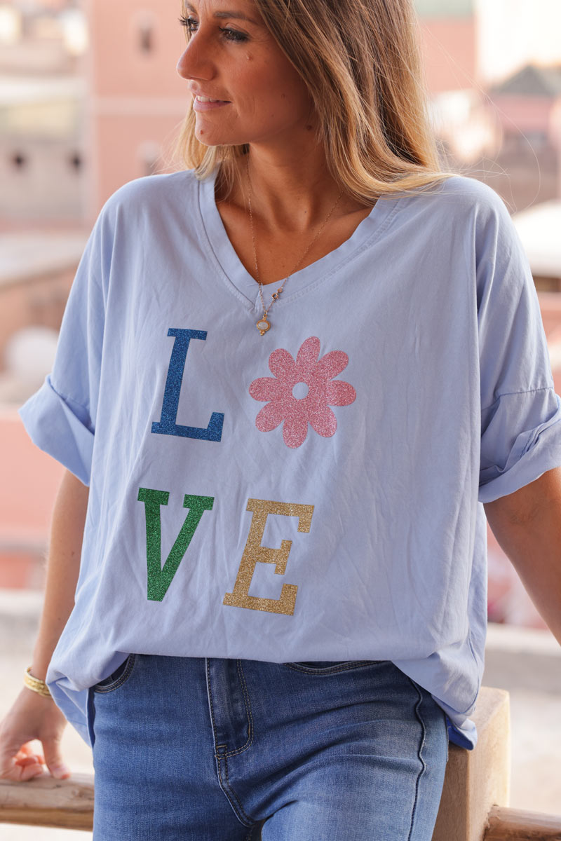 Camiseta grande de algodón azul cielo con mangas holgadas LOVE flores brillantes