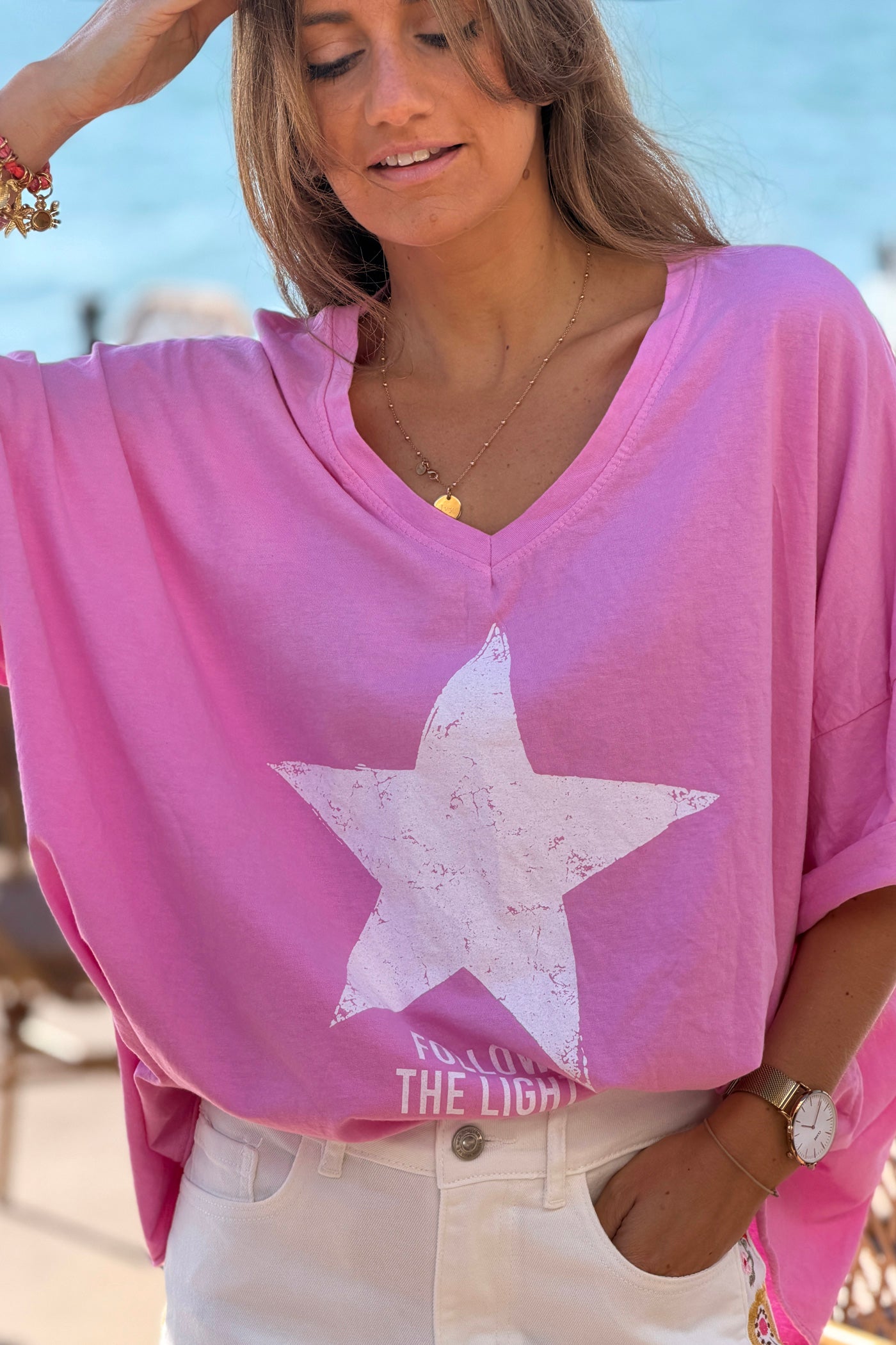 Tshirt large et loose rose en coton étoile follow the light col v