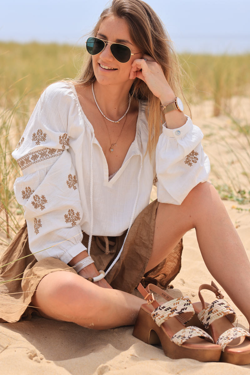 Off white blouse with camel embroidery and tassel ties