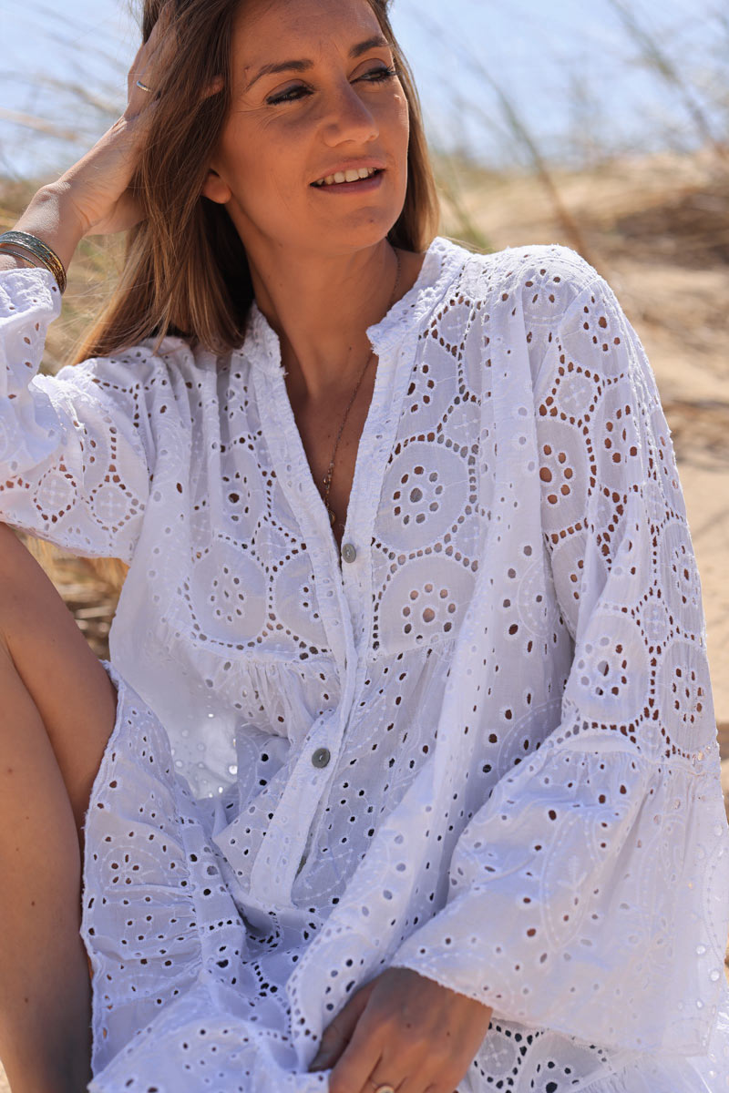 White broderie anglaise tiered blouse with flare sleeves