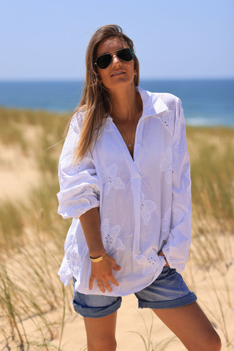 White v-neck blouse with flower embroidery