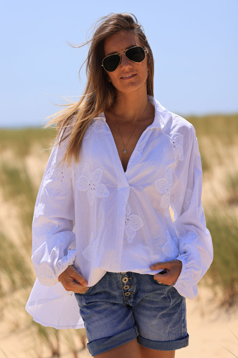 White v-neck blouse with flower embroidery