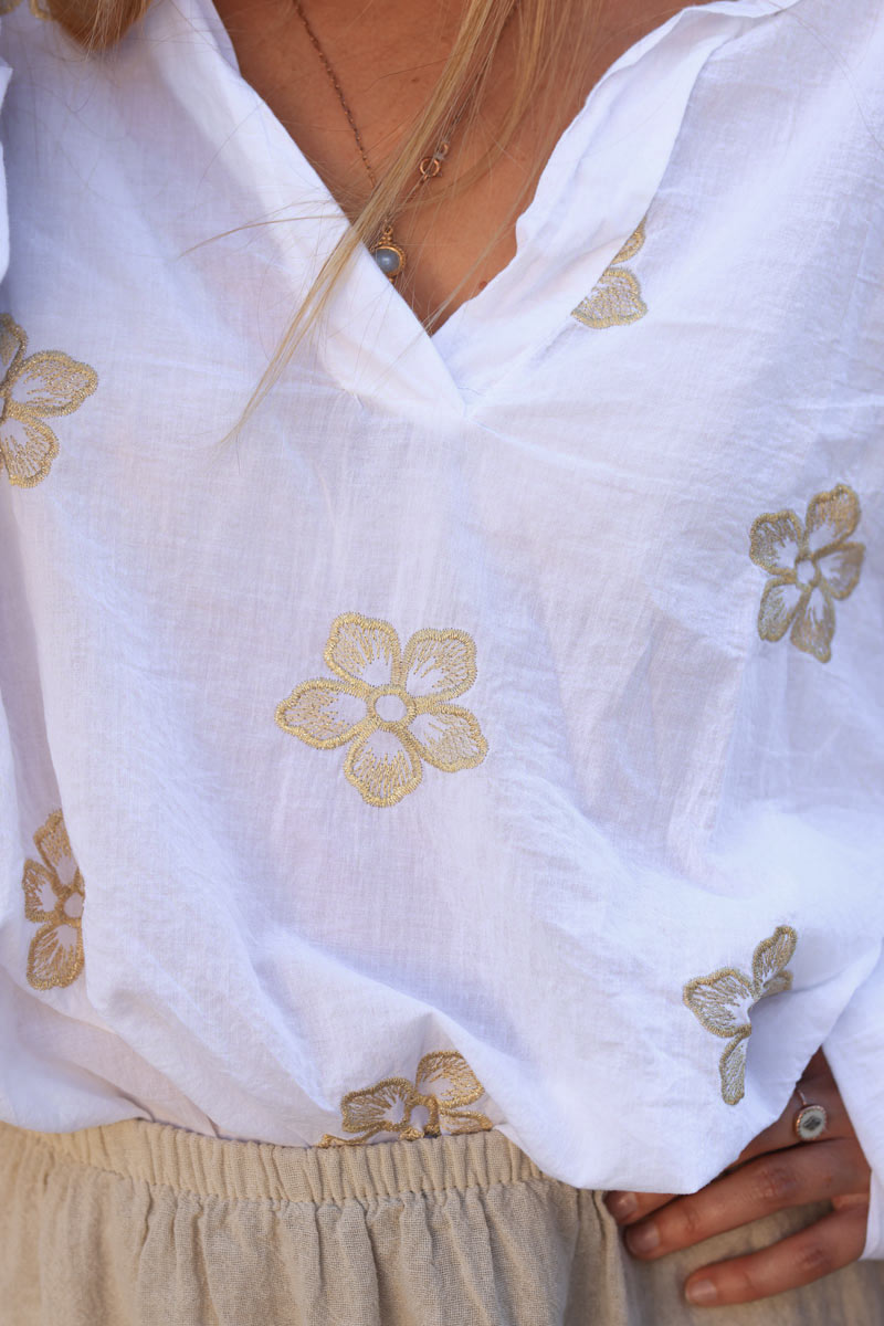 White relaxed fit blouse with gold metallic flower embroidery