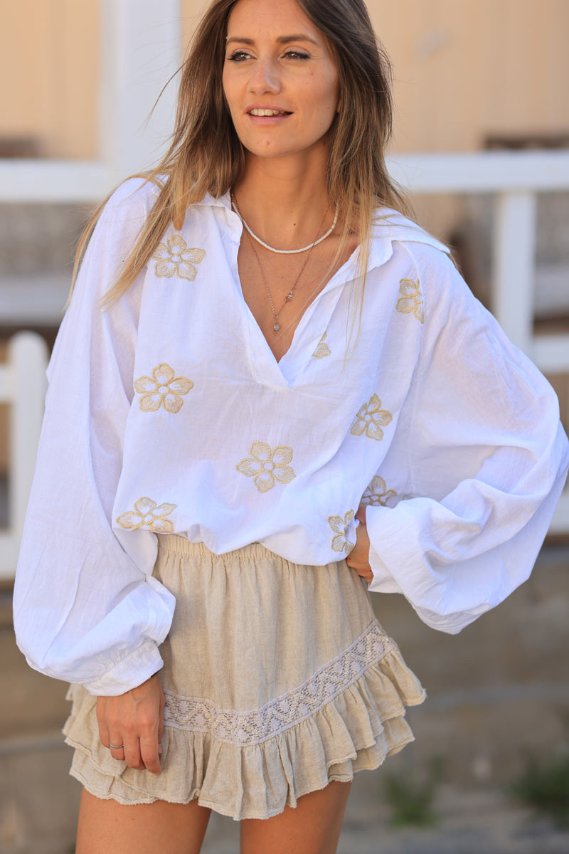 White relaxed fit blouse with gold metallic flower embroidery