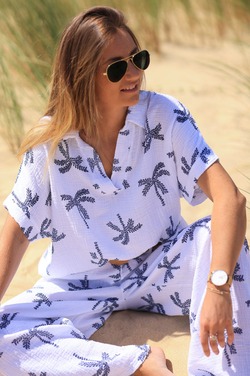 White cotton gauze blouse with navy blue embroidered palm tree