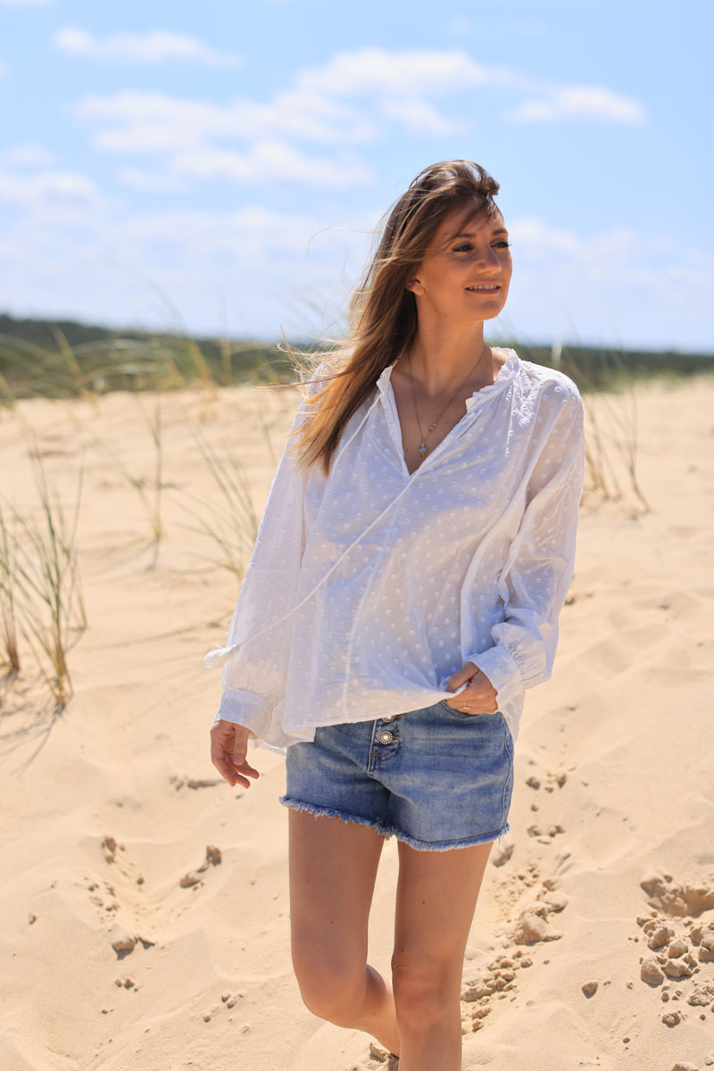 White polka dot embroidered cotton blouse with tassel ties