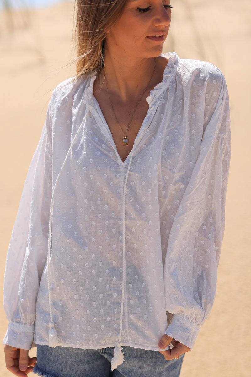 White polka dot embroidered cotton blouse with tassel ties