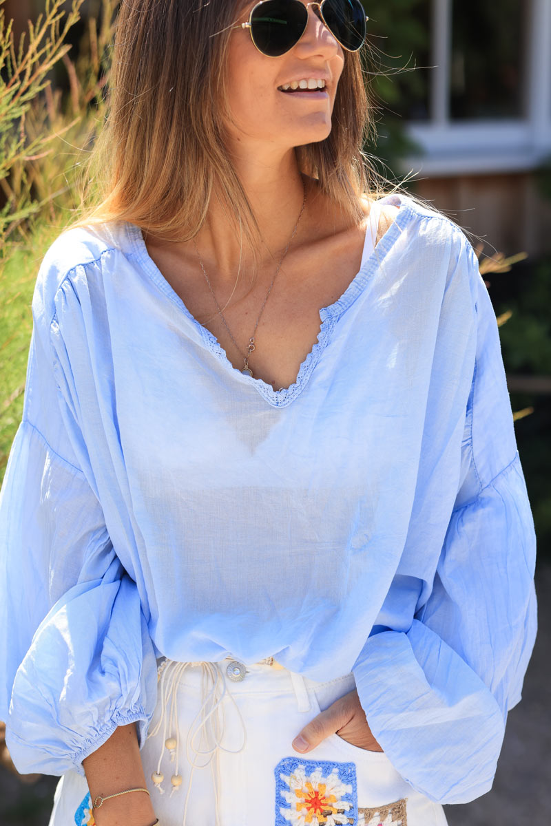Sky blue oversized cotton v-neck blouse with embroidery detail