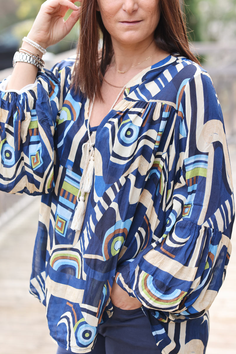 Floaty semi sheer tunic blouse in navy blue sprial graphic print