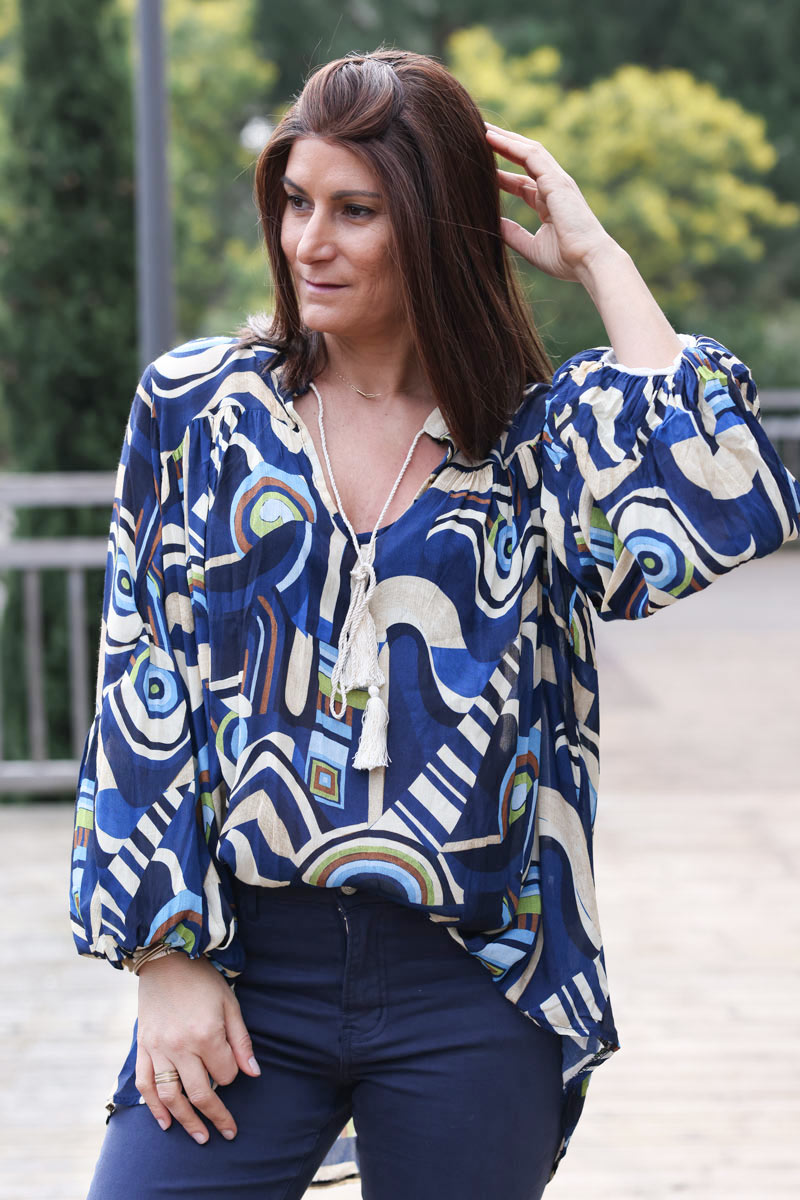 Floaty semi sheer tunic blouse in navy blue sprial graphic print