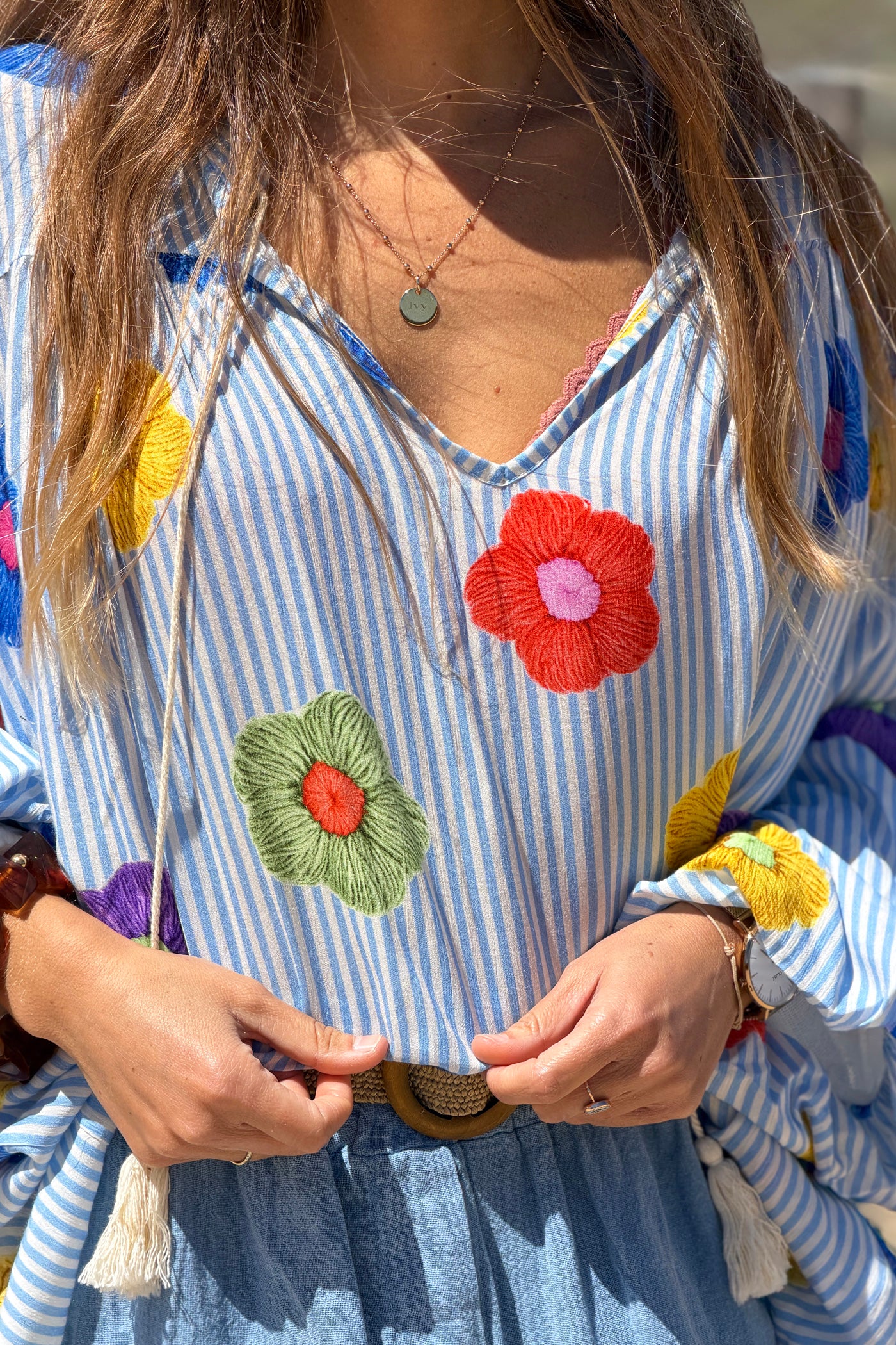 Floaty semi-sheer blouse with blue stripes and colourful flower print