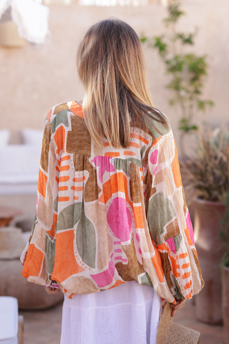Floaty semi sheer blouse with orange pink ethnic graphic print