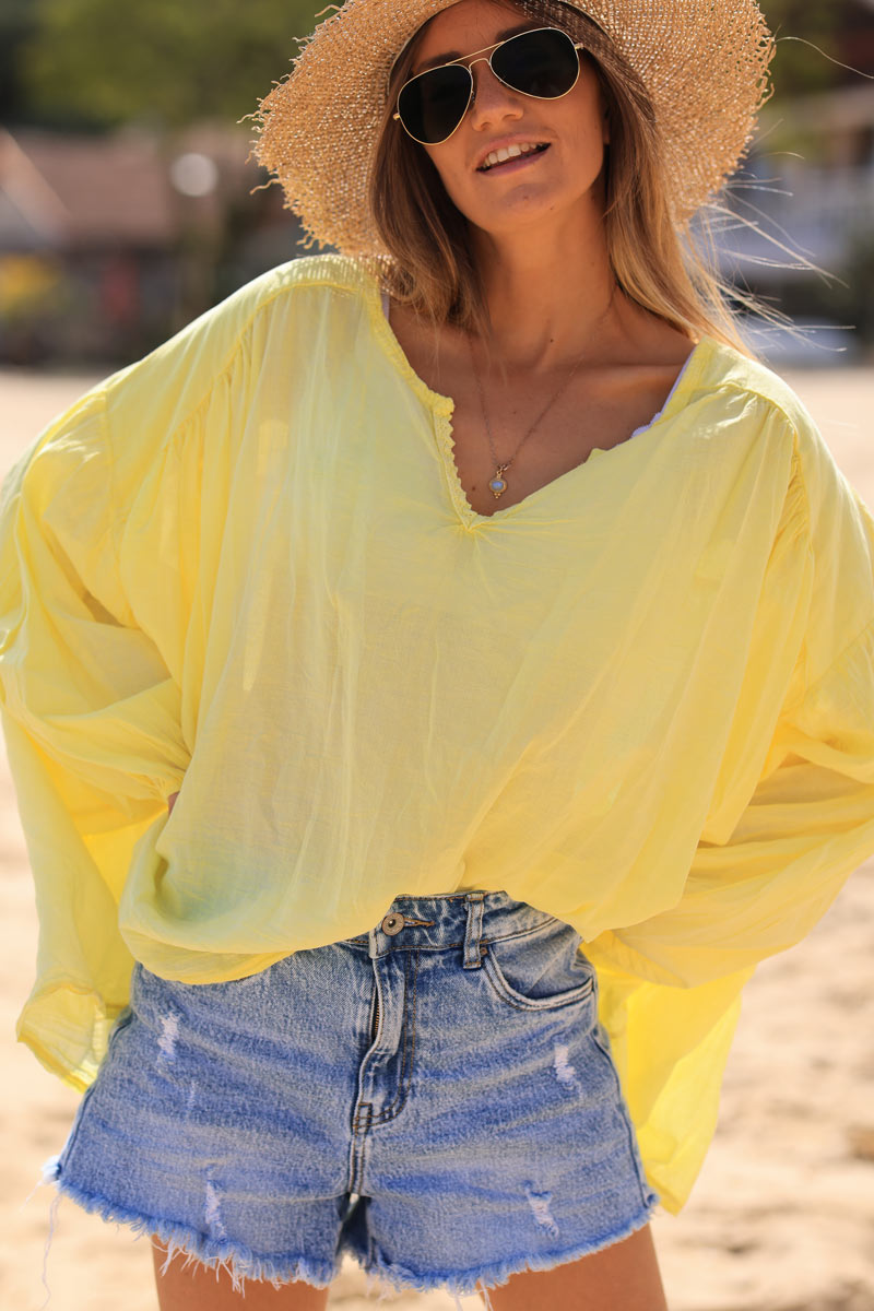 Yellow oversized cotton v-neck blouse with embroidery detail