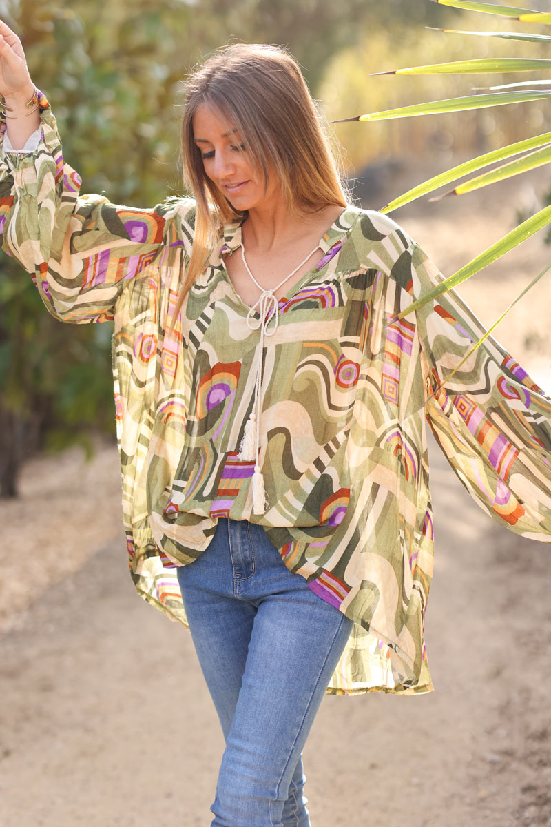 Floaty semi sheer tunic blouse in khaki sprial graphic print