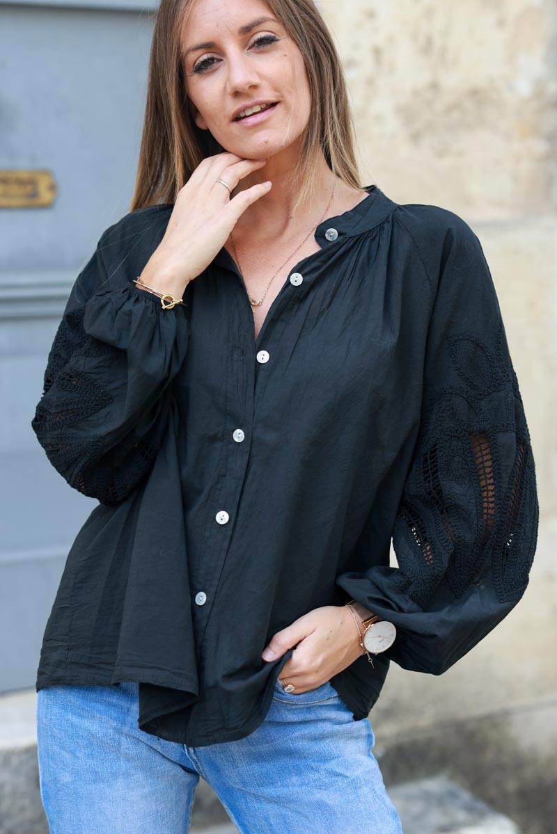 Black blouse with open crochet sleeves