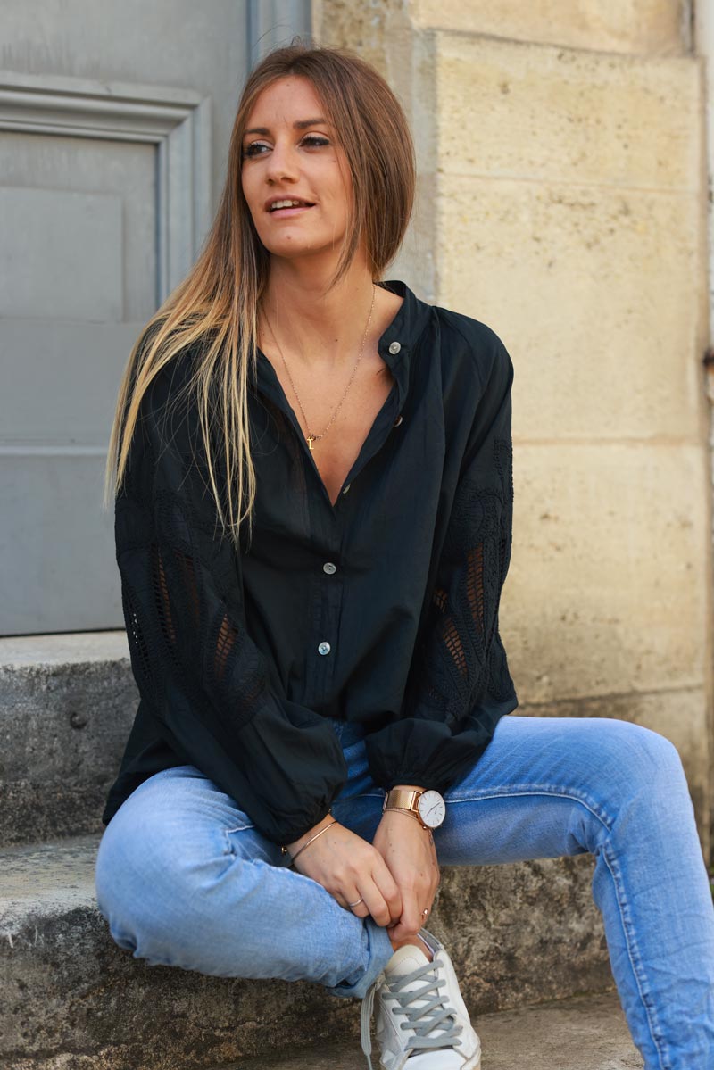 Black blouse with open crochet sleeves