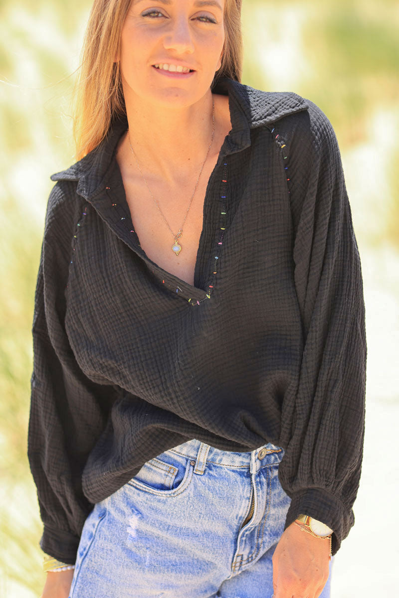 Black cotton gauze blouse with colored threads seams detail 