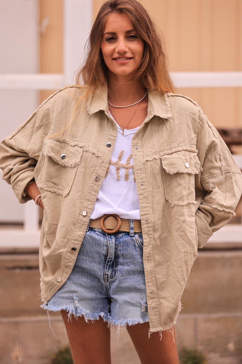 Beige denim jacket with 'smile' and flower embroidery