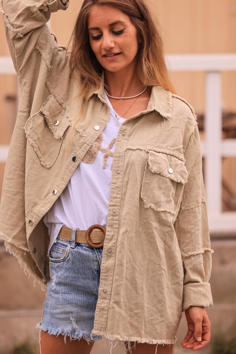 Beige denim jacket with 'smile' and flower embroidery