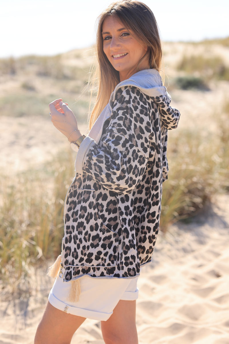 Veste en coton à capuche matière jogging imprimé léopard avec zip