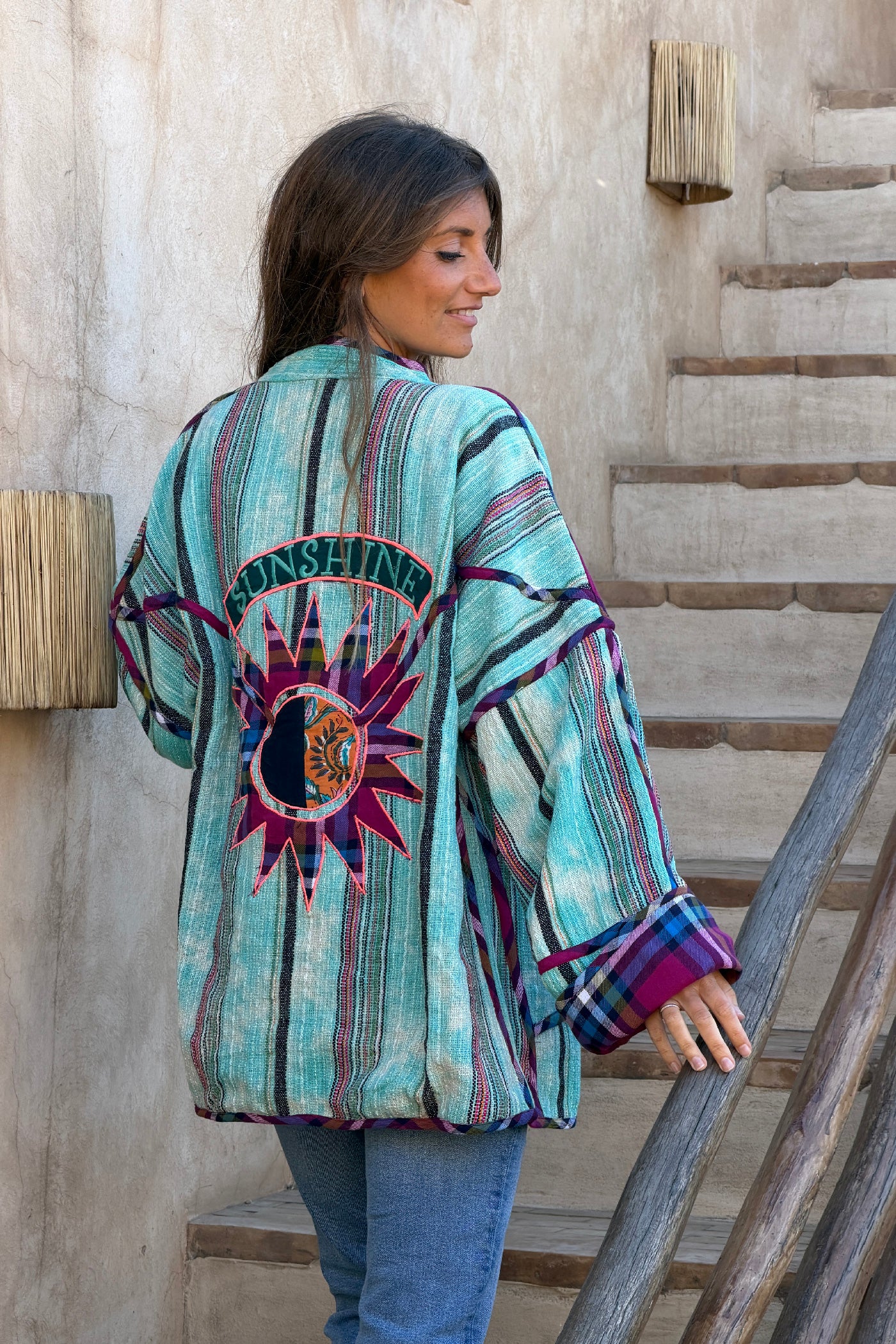 Veste en coton tissé turquoise et violet style péruvien broderie sunshine