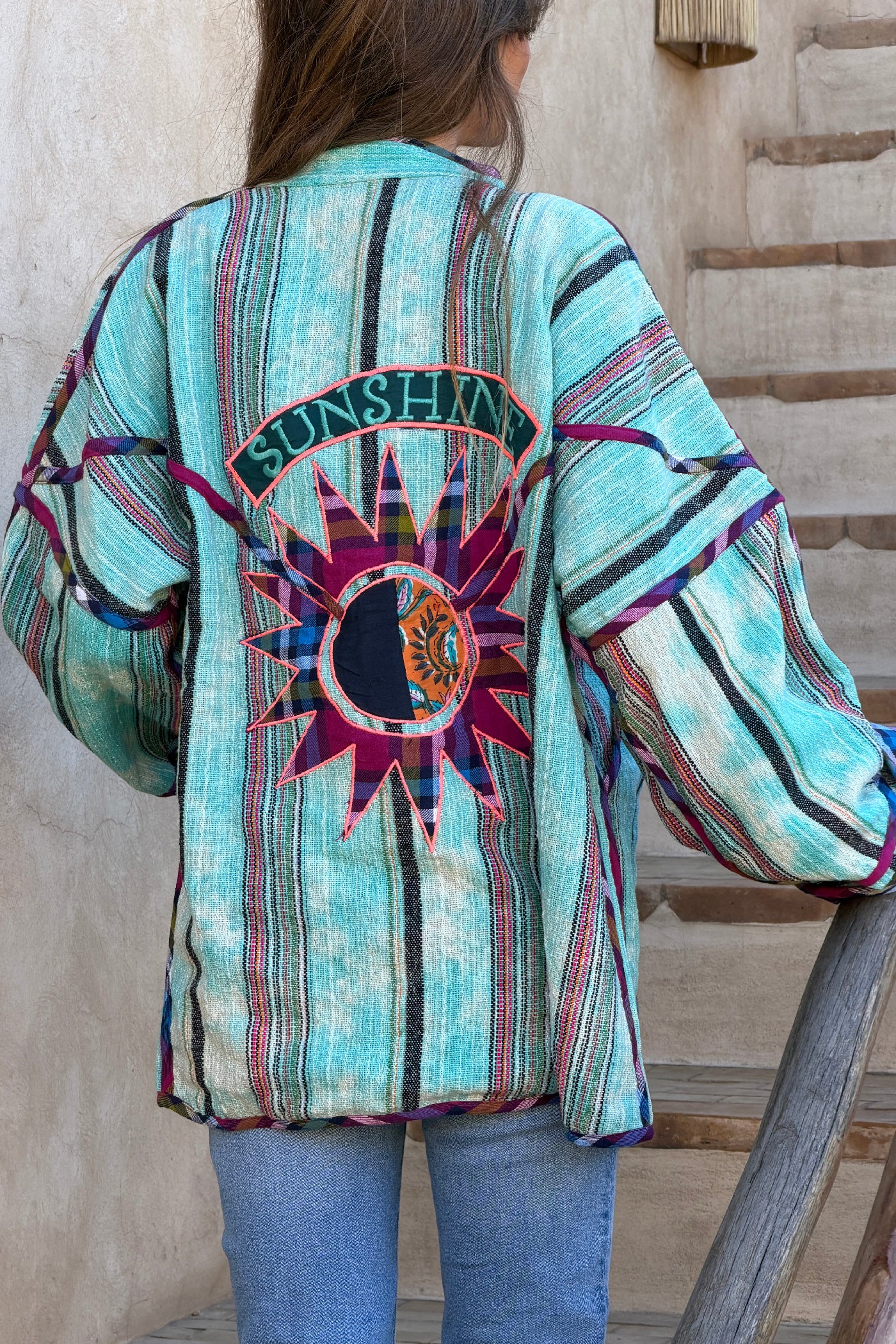 Veste en coton tissé turquoise et violet style péruvien broderie sunshine