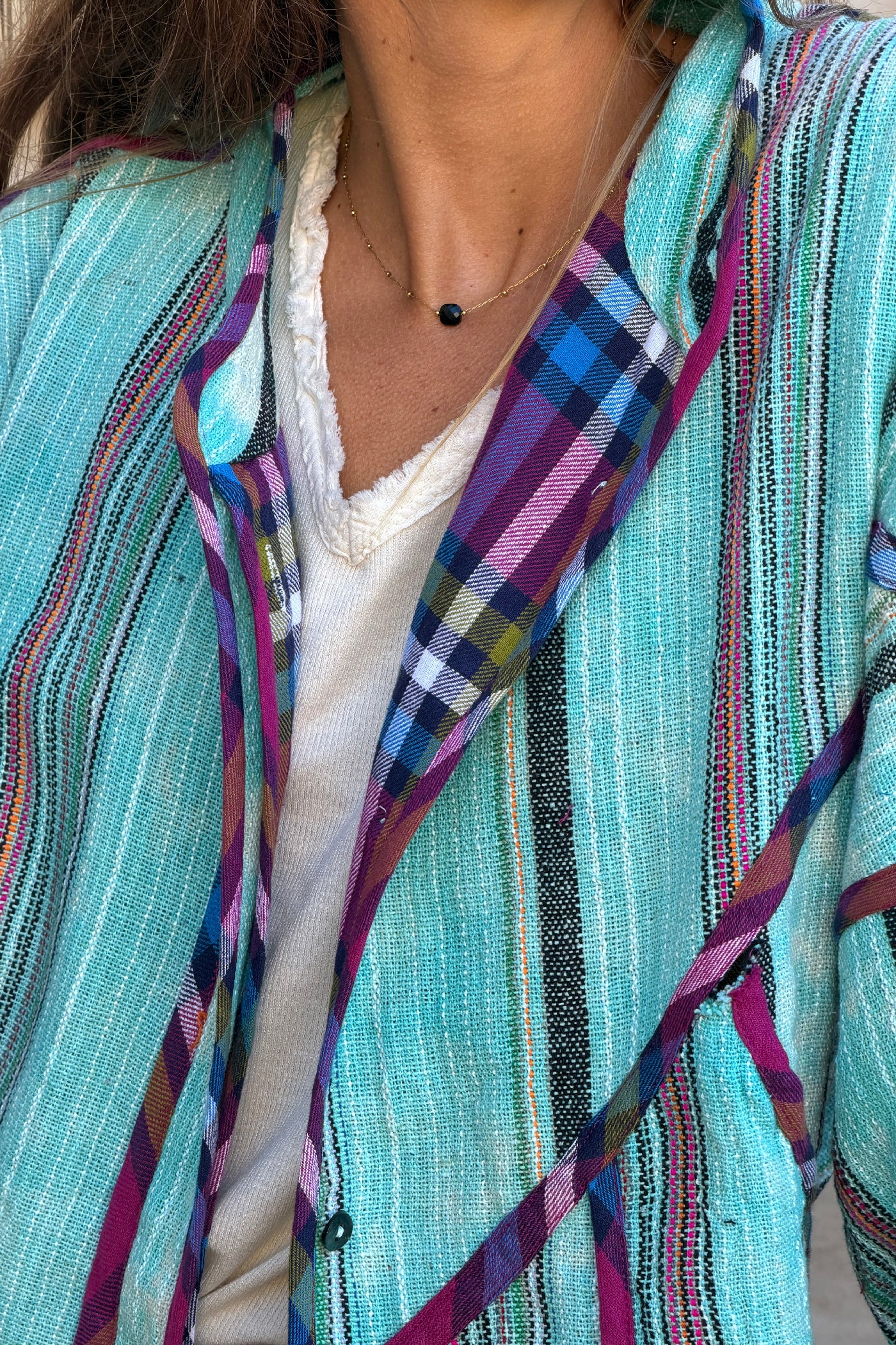 Veste en coton tissé turquoise et violet style péruvien broderie sunshine