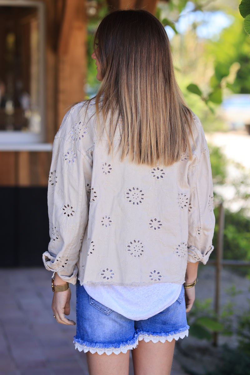 Beige cropped denim jacket with broderie anglaise flowers