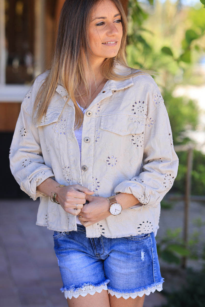 Beige cropped denim jacket with broderie anglaise flowers