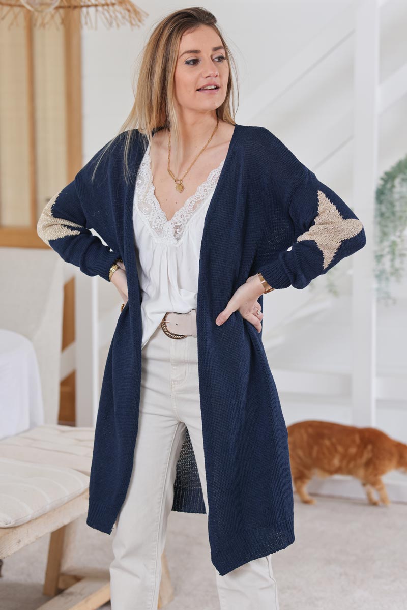 Navy blue longline cotton-knit cardigan with large gold stars on elbows