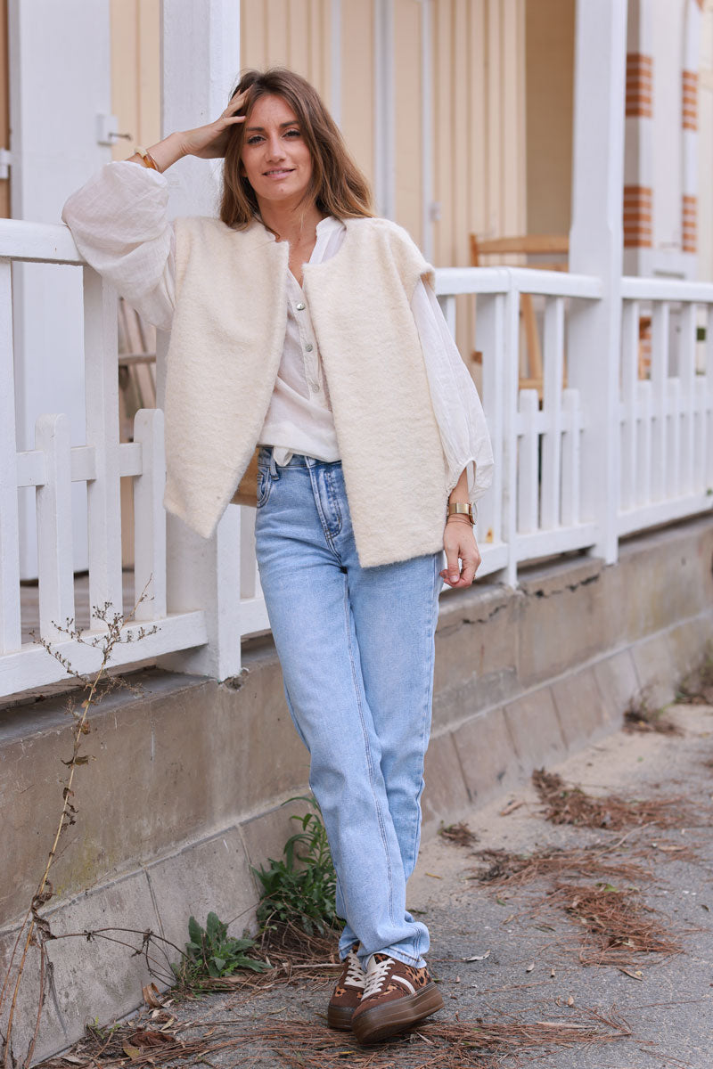 Chaqueta beige sin mangas de fieltro de lana cocida con bolsillos